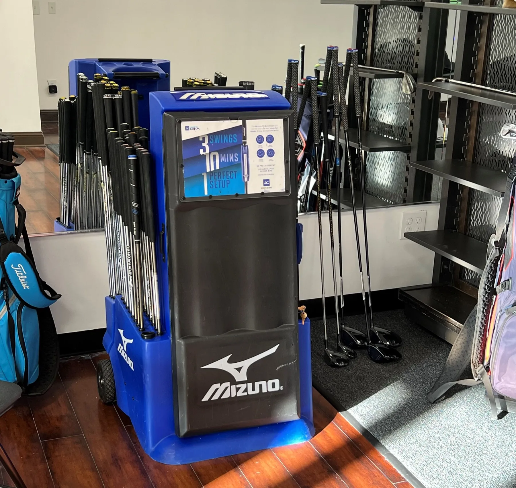 Mizuno fitting cart with shafts and heads